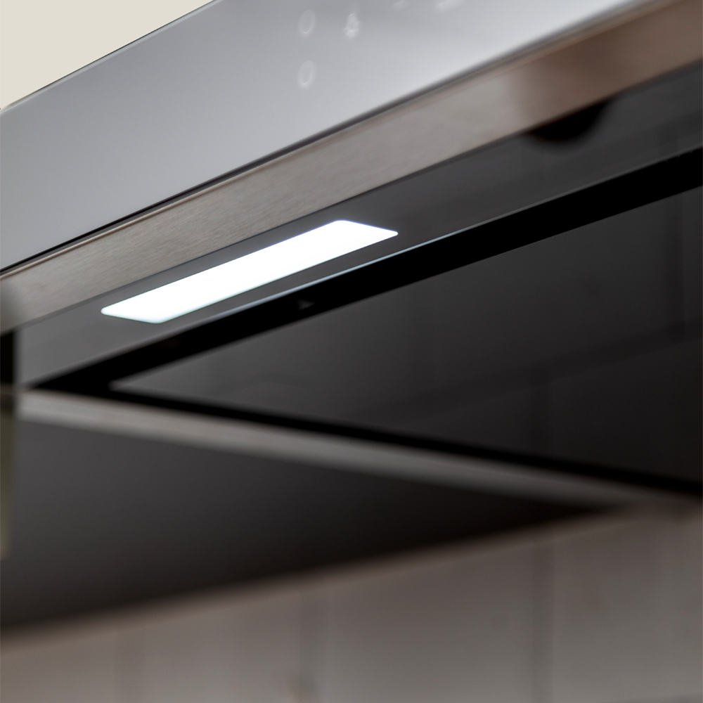 Campana de Pared Control Gestual Motion 60 cm 600 m³/h FDV, de acero inoxidable y cristal templado, con 3 velocidades y filtros de aluminio y carbón activado