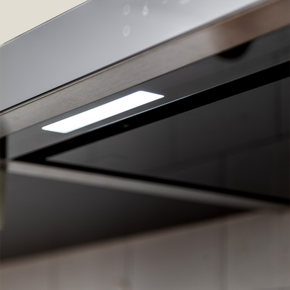 Campana de Pared Control Gestual Motion 60 cm 600 m³/h FDV, de acero inoxidable y cristal templado, con 3 velocidades y filtros de aluminio y carbón activado